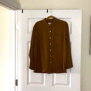 Ladies polyester shirt in a rich brown color